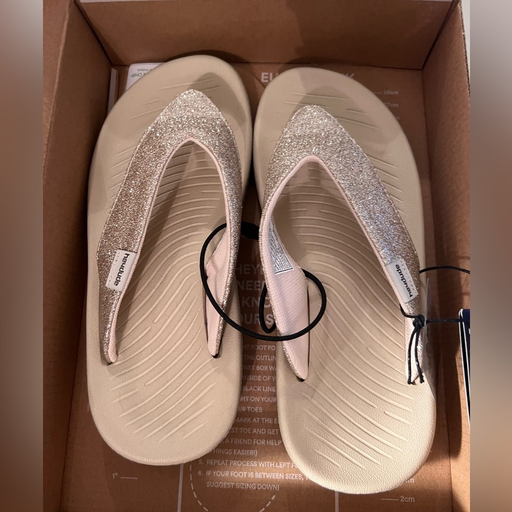 Hey Dudes Meg flip flops in Gold Glitter. US size 7. Brand new. Never worn.